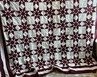 #201	quilt 	Mauve/cream 8 point star machine/hand pieced 94x84	 $45.00 			
