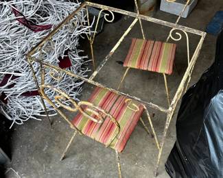 #70	Kids Metal Table w/2 chairs (table missing the top and rusty) - 24x18x21	 $25.00