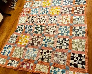 #186	quilt	orange white flower design hand stitch quilt top 62x68	 $35.00