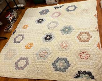 #191	quilt	Grandma flower garden quilt hand stitch as is stain 68x74	 $75.00