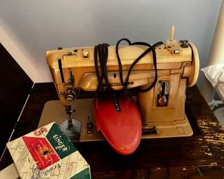 #89	Singer 404 Metal Sewing Machine w/attachments in Cabinet	 $50.00