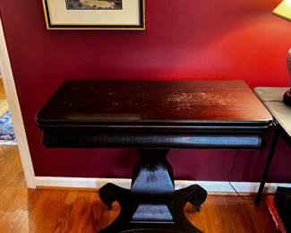 #14	wooden game table on pedestal base 34x17to34x30	 $175.00