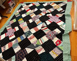 #185	quilt	scrappy hand stitch quilt top  with X design 70x92	 $30.00