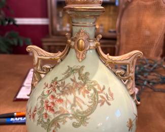 Royal Sphinx Boch Decorative Porcelain Ewer (c. 1930–1950) Picture 1 of 2. 
Large vintage porcelain ewer with celadon green ground, raised gold scrollwork, and Japonesque floral decoration. Ornate sculpted handles and finial. Marked “Royal Sphinx Boch, Made in England” on underside. Excellent statement cabinet or mantle display piece.
Vintage condition (repaired tip)                                                          Price $60 – $75 or BO
