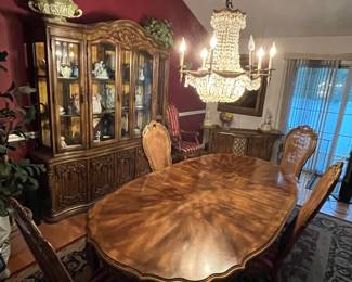 Gorgeous vintage French Provincial dining suite featuring a burl-veneer sunburst oval table, 6 cane-back upholstered chairs, ornate carved china cabinet, and matching buffet. Excellent condition with beautiful patina. Timeless style and sturdy construction — perfect for formal dining or decorative statement rooms. Must see in person.                                                                                      Table + chairs: $1,350
Hutch: $475
Buffet: $375
Entire set:  $2,150
First Day Offer Full Set $1800