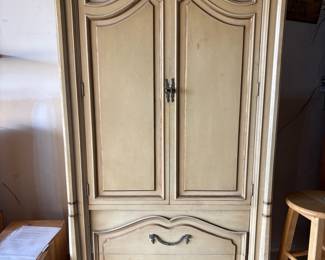 Charming vintage French Provincial armoire in a distressed cream finish with original hardware. Great for wardrobe storage, linens, nursery, craft supplies, or entryway organization. Solid construction and clean drawers. Versatile farmhouse-cottage style piece.
Pickup only – bring help to move (it’s heavy).                              Price: $375 or BO