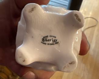 Vintage English Bone China Flower Figurine (Thorley England) - Picture 2 of 2.
Delicate vintage bone china floral figurine featuring hand-formed porcelain rose petals and leaves in a small footed base. Marked “Thorley, Made in England” on underside. Classic collectible cabinet piece for English china collectors and curio displays.
Very good vintage condition with bright color.
Price: $24 or BO