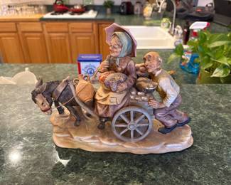 Vintage Porcelain & Gilt Metal Compote
Romantic courting scene transfer panels with rich gold scrollwork and a deep cranberry center, mounted on an ornate cast gilt base. Excellent decorative accent for vanities, foyers, or serving wrapped chocolates. Beautiful vintage patina.
Price: $85