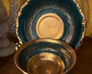 Vintage Heavy Gold Gilt Porcelain Cabinet Cup & Saucer
Elegant vintage porcelain cup and saucer featuring a rich emerald/teal ground with ornate raised gilt floral scrollwork and heavily gilded interior. Scalloped, gold-trimmed rims and detailed patterning throughout. A classic European cabinet cup ideal for curio display or fine china collections.
Very good condition with bright gilding.
Pricing: $65 or BO