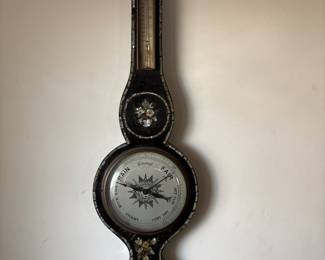 Victorian Mother-of-Pearl Inlaid Banjo Barometer (c.1880–1900)
Beautiful antique wall barometer with mother-of-pearl floral inlay, silvered dial, thermometer, and hygrometer. Ebonized wood case with original brass bezels. Classic English Victorian craftsmanship. Wonderful decorative display piece.
Price: $275 or BO