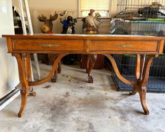 Vintage English Regency–style writing/console table with carved paw feet and curved stretcher base. Solid and well-built with two working drawers and decorative brass pulls. Beautiful statement piece for an entryway, behind a sofa, or as a writing desk.
Good vintage condition.
Price: $275 or BO 
Pickup only – bring help (solid piece).