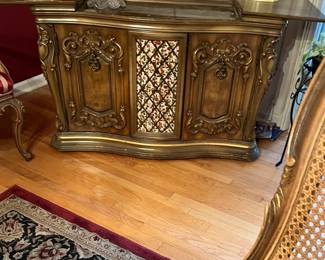 Gorgeous vintage French Provincial dining suite featuring a burl-veneer sunburst oval table, 6 cane-back upholstered chairs, ornate carved china cabinet, and matching buffet. Excellent condition with beautiful patina. Timeless style and sturdy construction — perfect for formal dining or decorative statement rooms. Must see in person.                                                                                      Table + chairs: $1,350
Hutch: $475
Buffet: $375
Entire set:  $2,150
First Day Offer Full Set $1800