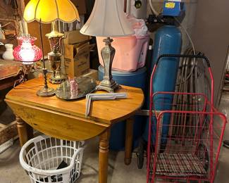 Lamps, a mirror dresser tray and red roller basket.