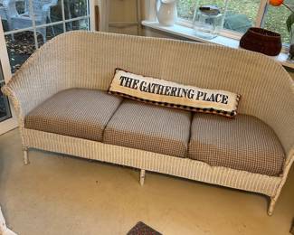 A second antique sofa suggesting folks gather.