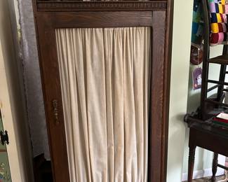 A modest cabinet to stow goods out of sight.