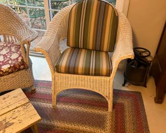 An older wicker chair in great used condition.