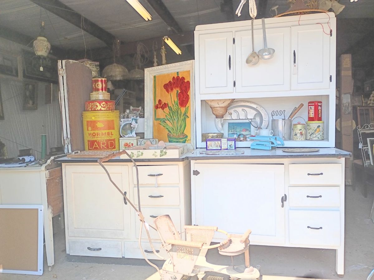 Vintage cabinet with built in flour sifter and icebox under pull out enamel counter top. Upper storage cabinet and drawers.
Smaller unit with icebox, drawers and enamel counter top.