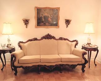 Three piece French style living room suite imported  from Europe.
The three cushion sofa is 8ft in length.
The two cushion loveseat is 6ft in length.
The arm chair is 34 inches in width.
The wood is walnut.