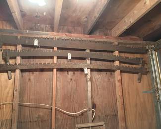 Blacksmithed two man saws.