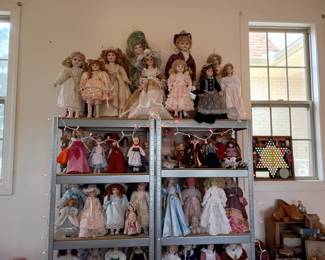 Large doll collection featuring fashion dolls from the 1950s, Storybook dolls, china and porcelain dolls and collector Barbie dolls.