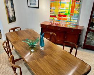 Incredibly Rare Design!!! Mid Century Danish Dining Table in Rosewood, Johannes Andersen for Uldum 1960s. Two center leaves extend this stunner to approx. 103". Some surface scratches will need restoration, chairs sold separately.