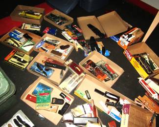 hundreds of pocket knives