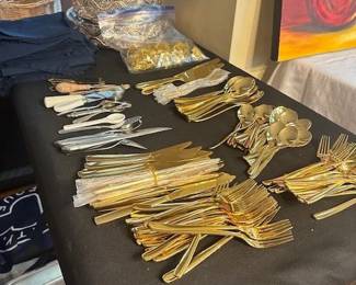 set of 24 gold sterling flatware