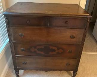 Antique chest of drawers. It would be a great piece to refinish and sell. 