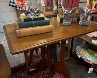 vintage wooden table with gorgeous legs, vintage decorative book set