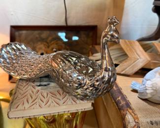 vintage silver-toned peacock figurine