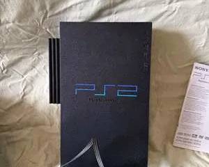 Sony PlayStation 2 SCPH-50001 Console with Controllers, Games, Manuals, and Cables