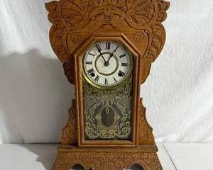 Antique Ornate Carved Wood Mantel Clock with Roman Numerals and Brass Pendulum