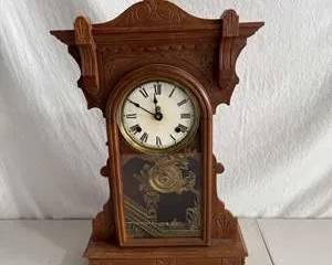 Antique Mantel Clock with Roman Numerals and Brass Pendulum