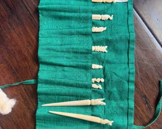 Bone cocktail sticks or hair sticks? Made for Neiman Marcus