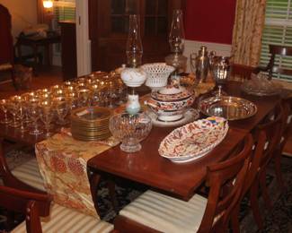 Set of 10 matching dining chairs and antique gold band stemware and desert plates