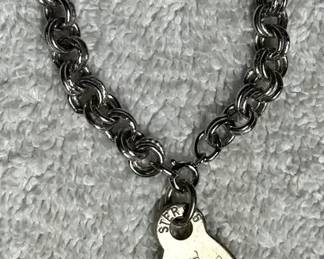 Tiffany Co. Return to Tiffany Oval Tag