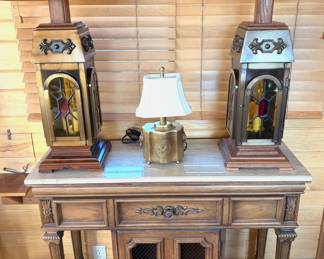 A pair of vintage electric candle lamps, a Wildwood Tea Box Lamp, and a vintage Thomasville flip-top server