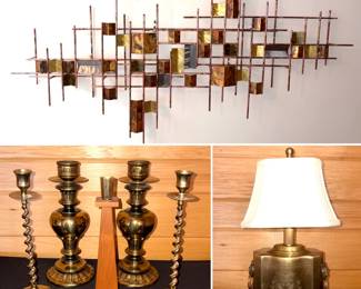 A Curtis Jere abstract brutalist metal wall sculpture, set of brass candlesticks, vintage wooden candle holder and a Wildwood Tea Box antique patina brass table lamp with a bone silkette shade.