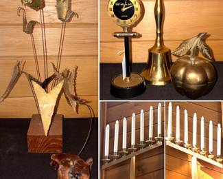 A vintage Brutalist metal sculpture, Swank “will return at” desk/cigarette lighter, brass bell, a trinket box paperweight shaped like an apple, and a Tenebrae hearse.