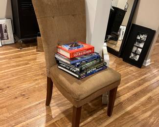 Upholstered chair and books