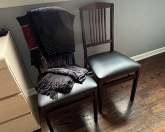 Folding chairs + ladies pretty scarves