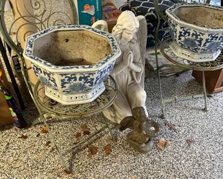 Garden chairs, planters and cherub and angel