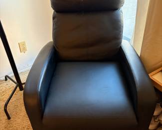 Black leather recliner in mint condition