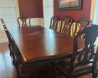 Dinning room table and 8 chairs