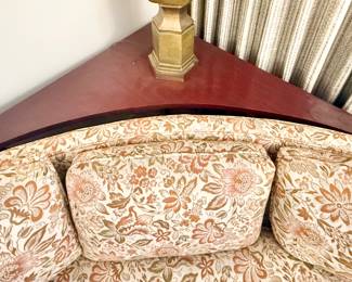 MCM corner table behind couch