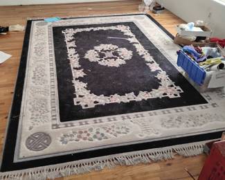 ONE OF TWO CHINESE SCULPTED RUGS