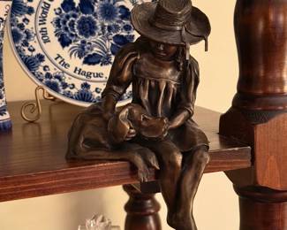 Girl with dog bronze statue, approx 6”h x 5.5”w