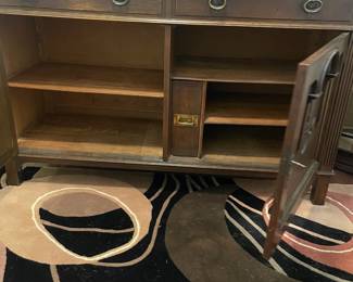 C3 - $1,750. English Renaissance Revival Sideboard. Appraisal dates it to late 19th century. Measures 60" wide x 22.5" deep x 77" tall. Loose fretwork on both sides and missing minor trim pieces. Sturdy and GORGEOUS! Homeowner shipped it back from England in the 90s.