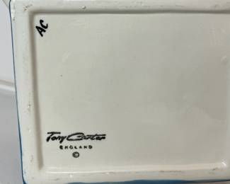 C43 - $30. Vintage Tony Carter Teapot with Stack of Books & Cup.