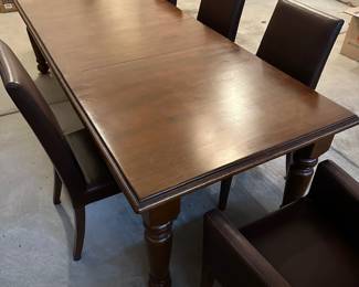 C4 - $1,500. Pottery Barn Table with 8 chairs. Table has 2 leaves. 2 captains chairs. 6 regular chairs. Measures 40" wide x 6' long with NO leaves in. Set includes 2 - 16" leaves. When all together it is 104". Table surface has some gentle wear marks but no huge gouges or issues. Chairs are all in very good condition. Most were scattered around the house in guest bedrooms and not regularly used.